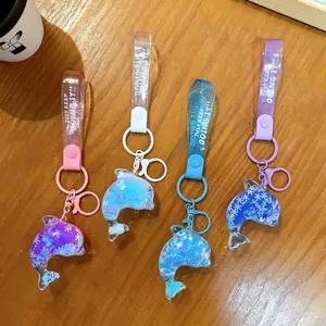 Cute whale quicksand liquid oil keychains with colorful glitter and snowflake charms