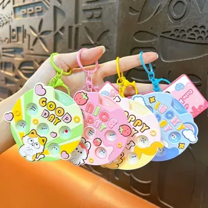 Set of four colorful cute animal dice machine keychains, decompression bag charms.