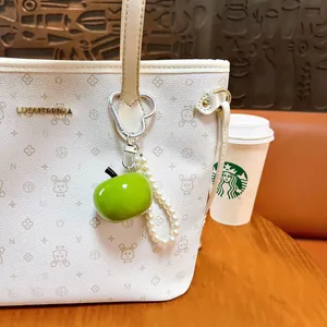 Creative green resin apple keychain with white pearl bead string and heart-shaped metal clip