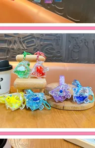 Porte-clés animaux marins liquides colorés avec sable mouvant et figurines de requins
