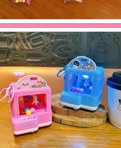 Mini porte-clés machine à pince lumineux pour se détendre en couleurs rose et bleu