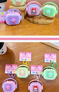Detailed view of mini radio voice recorder keychains in various macaron colors