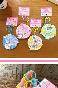 Cute animal dice machine keychains featuring cartoon unicorn, rabbit and cat designs