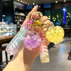 Creative heart-shaped liquid oil drifting bottle keychain with pearls and Bubble charm