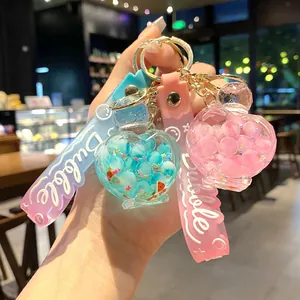 Creative heart-shaped liquid perfume bottle keychain with colorful quicksand beads and strap