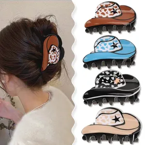 Detailed view of stylish cowboy hat shaped acrylic hair claw clips in four distinct colors.