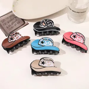 A detailed view showing five colorful acrylic cowboy hat-shaped hair claws in a set
