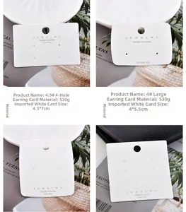 Detailed macro view of premium white paper earring display cards for jewelry packaging.