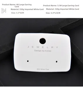 Detail of white jewelry display card with 925 Silver Post text on dark background.