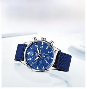 Close-up of a men's blue dial quartz watch with a durable navy blue nylon strap.