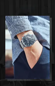 Close-up view of men's multifunctional quartz watch with gray nylon strap worn on wrist