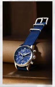 Detailed side view of blue OCHSTIN quartz chronograph watch with blue nylon strap