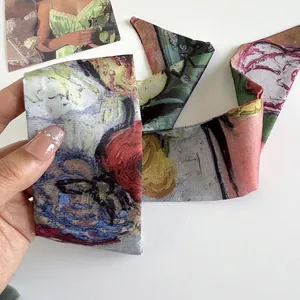 Close-up of Van Gogh oil painting style narrow silk scarf ribbon with vibrant colors.