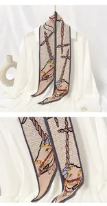 Detail macro view of pleated skinny scarf with elegant equestrian horse and rope print.