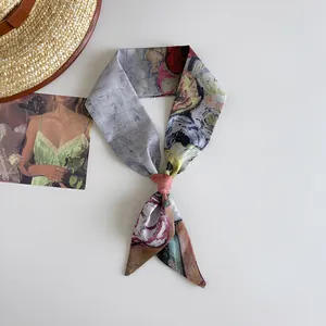 Close-up detail of a Van Gogh oil painting style silk twilly scarf tied in a decorative knot.