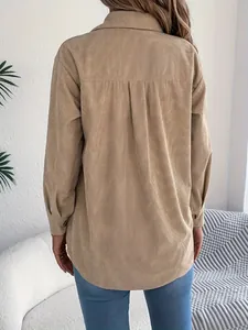 Back view of tan corduroy long sleeve shirt with relaxed fit and textured finish
