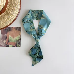 Detail view of the Van Gogh Almond Blossom print narrow silk scarf