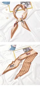 Close-up detail of pleated skinny scarf featuring elegant colorful horse pattern