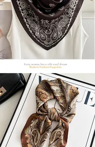 Close-up detail of elegant paisley print silk-like scarf for fashion styling.