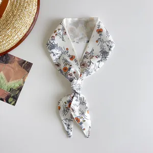 Floral oil painting style narrow silk scarf used as hair band or bag handle decoration.
