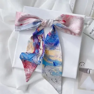 Close-up of Van Gogh style oil painting silk ribbon with colorful artistic patterns