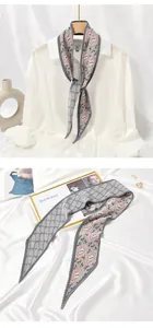 Detailed view showing the fine pleated texture of a women's geometric print skinny scarf