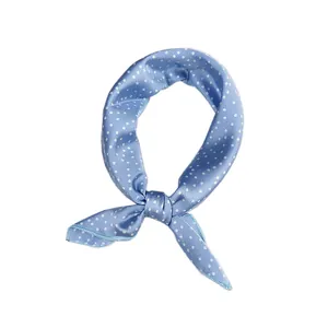 Elegant light blue silk-like neckerchief with stylish white polka dots for women