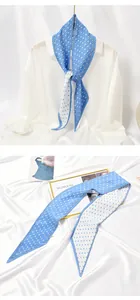 Blue and white polka dot pleated skinny scarf shown in stylized and flat lay views.