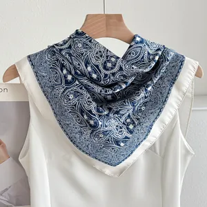 Elegant blue and white paisley pattern silk-like neck scarf for versatile fashion styling