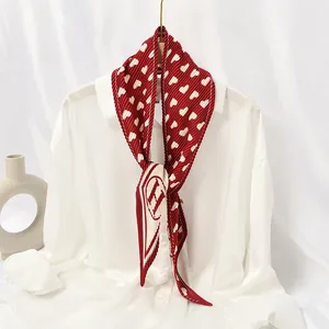 Elegant red pleated silk scarf for women featuring heart prints and a classic H logo design