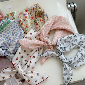 Collection of vintage floral cotton linen bandanas and scarves for women styling.