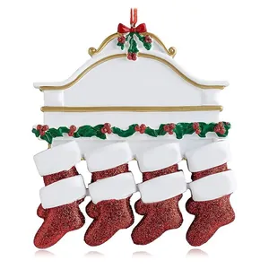 Detailed view of a Christmas ornament featuring four red glittery stockings on a mantel.