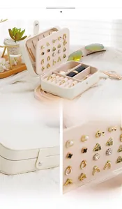 Detail view of the soft velvet lining and earring slots in a portable jewelry box