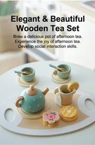 Close-up of a pastel green wooden tea set with cookies and accessories