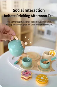 Detailed macro view of kids wooden toy tea set showing a teapot pouring into a cup
