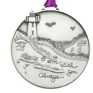 Silver lighthouse metal ornament with Always with you quote and a purple ribbon