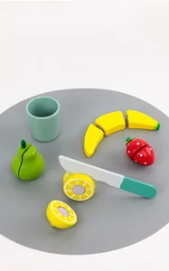 Wooden play food set featuring colorful fruits and a toy knife for toddlers