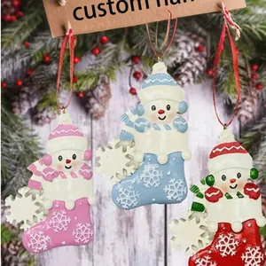 Personalized resin snowman stocking Christmas ornaments hanging in pink blue and red