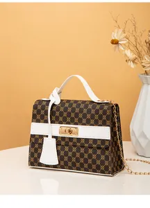 Fashionable monogram print small square handbag with white leather handle and gold chain