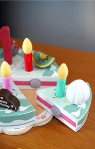 Detailed close-up view of wooden play cake toy slices featuring skin-friendly velcro fasteners