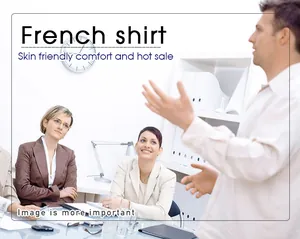 Men's white long-sleeve French shirt worn in a professional office meeting setting.