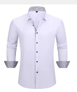 Front view of white long-sleeve business shirt with contrast striped collar details.