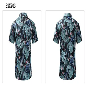 Detailed front and back views of a Hawaiian vintage tropical leaf print short sleeve shirt.