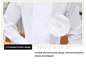 Detail view of white tuxedo shirt showing concealed buckle design and pleated front.