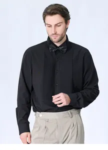 Detailed view of a premium black men's tuxedo shirt with a pleated front and silk bow tie