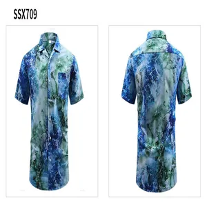 Detailed front and back views of a vintage blue and green abstract print Hawaiian shirt