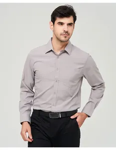 Detail of a men's formal grey long-sleeve dress shirt featuring a classic collar and pocket