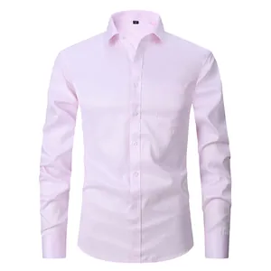 Classic men's light pink long-sleeved dress shirt featuring a subtle grid texture