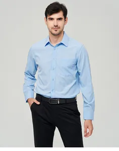 Detailed view of light blue men's long sleeve business casual shirt with front pocket