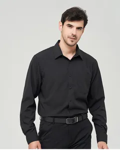 Model shot of a black long-sleeve shirt featuring a front pocket and sleek button-down style